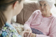 Elderly women and caregiver
